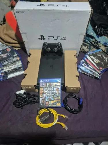Ps4 Slim, na caixa com todos os acessórios e 15 jogos mídia física, Apenas R$2.000,00