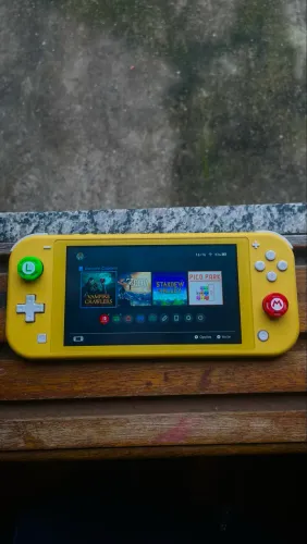 Nintendo Switch Lite + Zelda BotW - Impecável