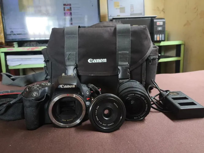 Sl2 + 2 lente + carregador + 1 bateria + um bolsa