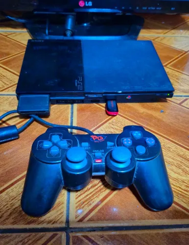 Playstation 2 slim com vários jogos no pen-drive 