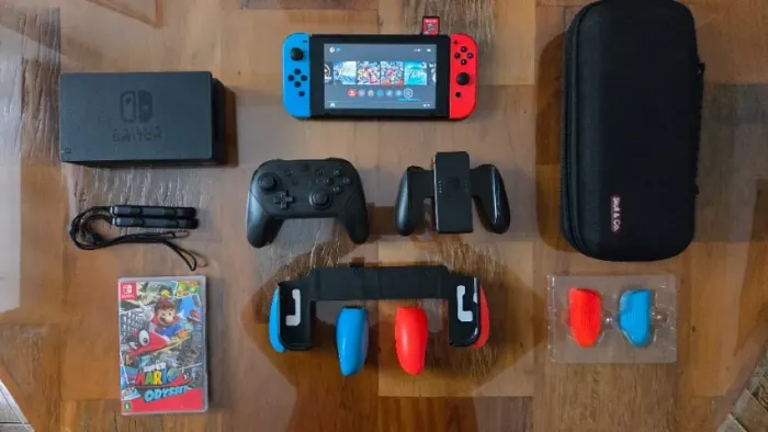 Nintendo Switch V2 + SanDisk Ultra 512GB + Pro Controller + Mario Odyssey + Case Skull & C