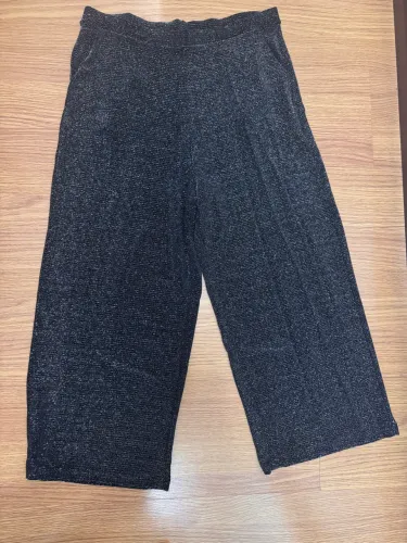 Calça em lurex 