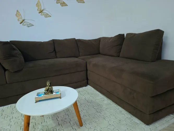 Sofa em L com chaise long e almofadas Soltas