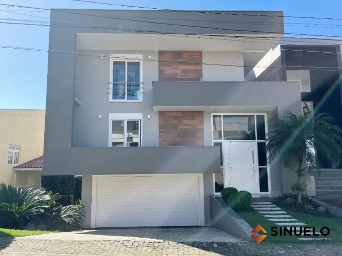 CASA EM CONDOMÍNIO 03 DORMITÓRIOS SENDO 01 SUÍTE