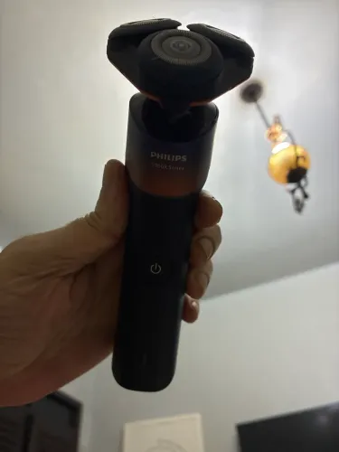 Vende barbeador elétrico com defeito