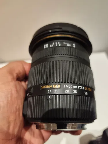 Lente Sigma 17 50 conservada 