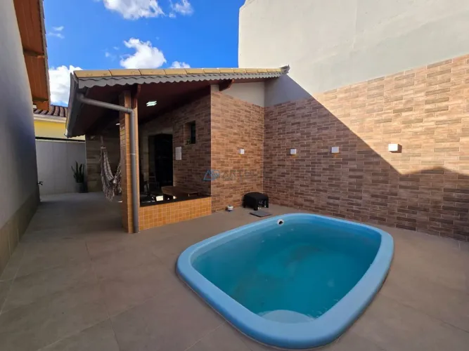 Casa Mobiliada à venda em Praia Grande com 3 quartos, área gourmet com piscina