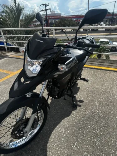 Vendo moto semi nova