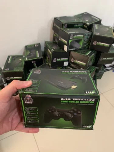 Videogame Stick 4K 64gb 2 Controles Sem Fio Console Portatil Jogos Retro Antigo