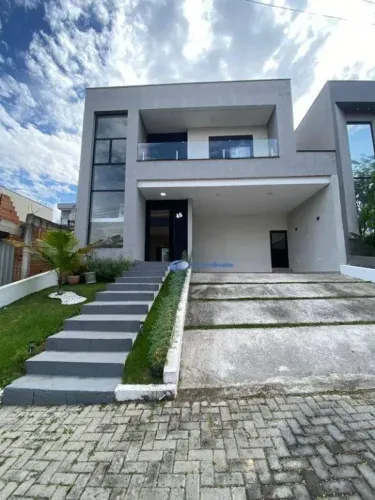 Casa com 3 dormitórios para alugar, 250 m² por R$ 7.880,49/mês - Condomínio Vem Viver Jaca