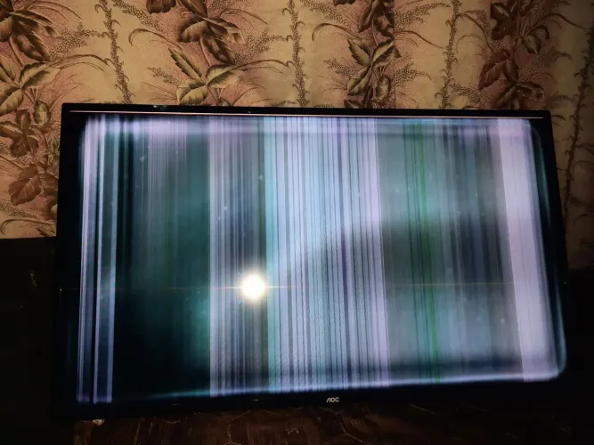 Tv Aoc 42p. Em funcionamento tem áudio mas a imagem com listras.