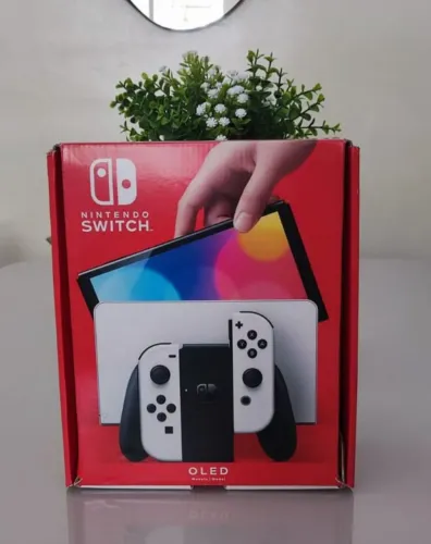 Nintendo Switch OLED 64GB + SanDisk 128GB