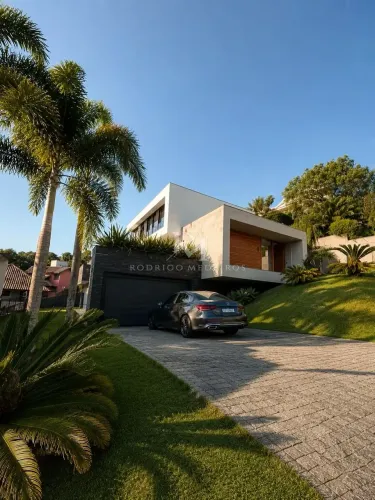 Casa de 3 suítes à venda no Cacupé, Florianópolis, com vista para o mar