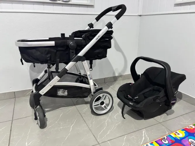 Vendo carrinho de bebê com bebê conforto