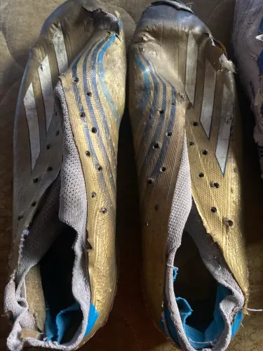 Chuteira f50 do messi com crava de ferro