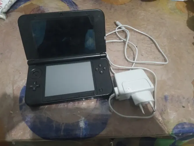 Nintendo com defeito (não dá tela) estou vendendo para alg se quiser colecionar ou vender