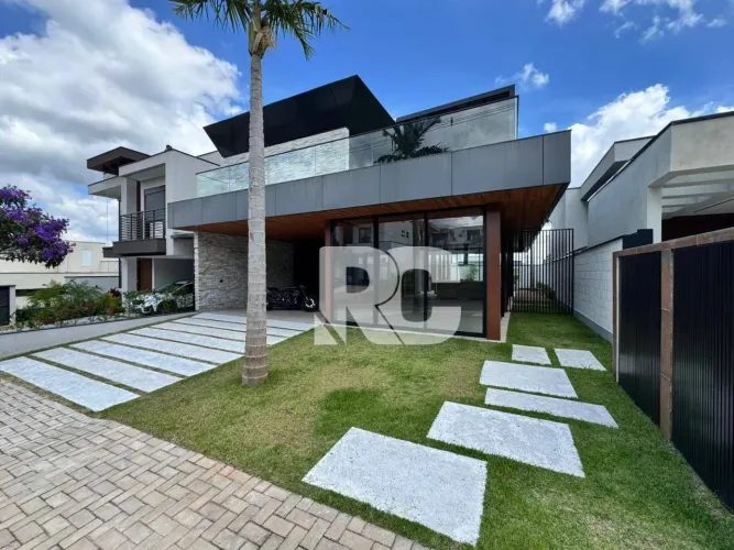 Sobrado com 4 dormitórios à venda, 280 m² por R$ 4.800.000,00 - Cézar de Souza - Mogi das