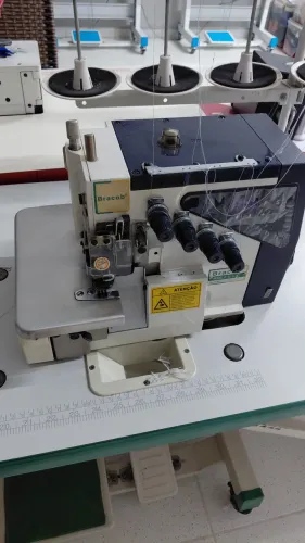 Vende se maquina interlock direct drive novissima