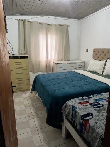 Vende se casa com mais 2 no quintal