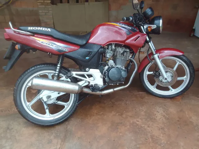 Motor customizado, escapamento original, motor mexido 240vc faz 54 km em 1 marcha, pneus o