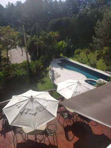 Casa com 4 dormitórios à venda, 850 m² por R$ 3.200.000,00 - Condomínio Refúgio dos Pinhei