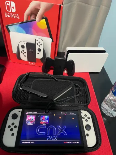 Nintendo switch Oled 64GB (+ 128GB no cartão de memória)usado desbloqueado