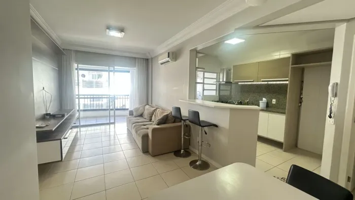 Apartamento com 2 dormitórios para alugar, 94 m² por R$ 6.705,68/mês - Coqueiros - Florian