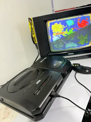 Console sega cd com mega drive