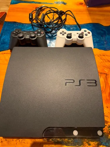 PS3 SLIM - 160gb - 7 JOGOS + GUITARRA Rock Band - estado de novo