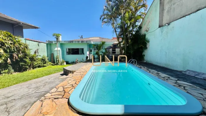 Casa com 2 dormitórios à venda, 228 m² por R$ 950.000,00 - Costeira do Pirajubaé - Florian