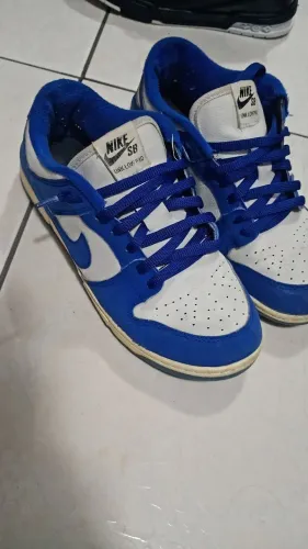 Tênis Nike azul usado em boa condição