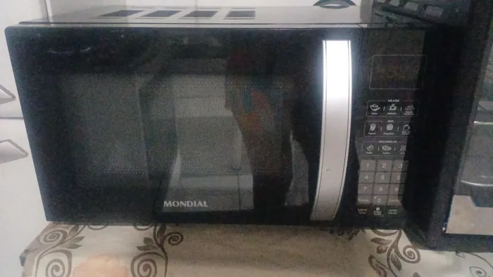Vendo ou troco esse micro-ondas novo por celular