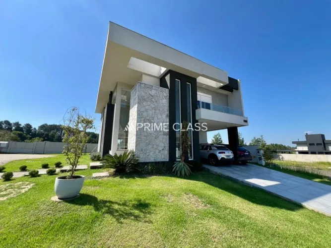 Casa em Condomínio 4 quarto(s), 2 suítes, living conceito aberto, 4 vagas- Reservas do Lag