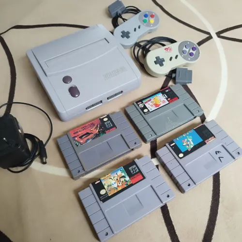 Super Nintendo baby + 4 fitas