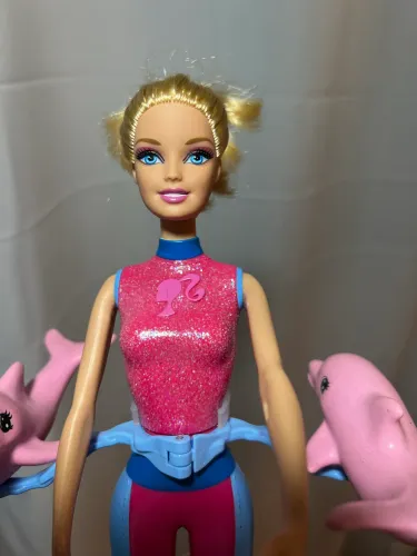 Barbie golfinho que gira 