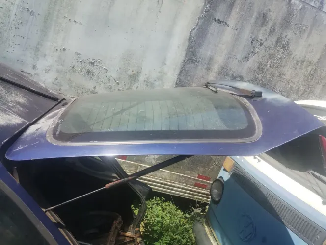 Tampa do porta-malas Escort Zetec 98 