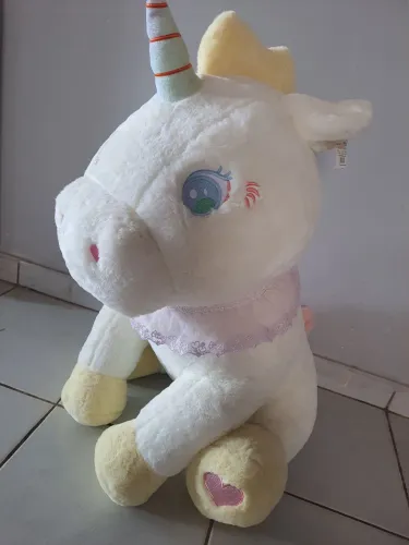 Unicórnio de pelucia