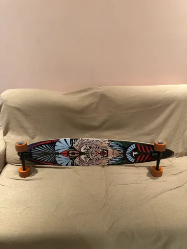 Longboard rodas laranjas