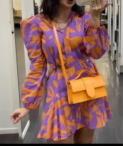 Vendo vestido novo manga longa com detalhes em pregas na saia