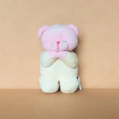 brinquedo - pelúcia chaveiro urso rosa e amarelo ajoelhado (usada)