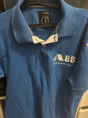 CAMISETA POLO ALEATORY