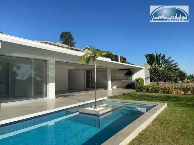 Casa com 3 dormitórios para alugar, 350 m² por R$ 14.445,08/mês - Condomínio Marambaia - V