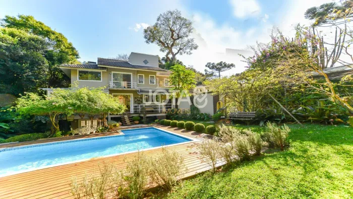 CASA EM CONDOMÍNIO EM SANTA FELICIDADE COM 4 SUÍTES EM MEIO A NATUREZA Casa em condomínio