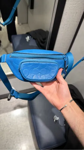 Pochette Coach 