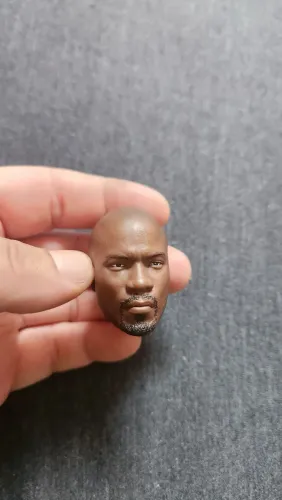 Action figure head Luke Cage