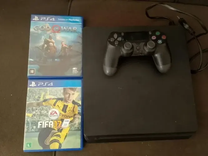 ps4 com dois jogos e um controle