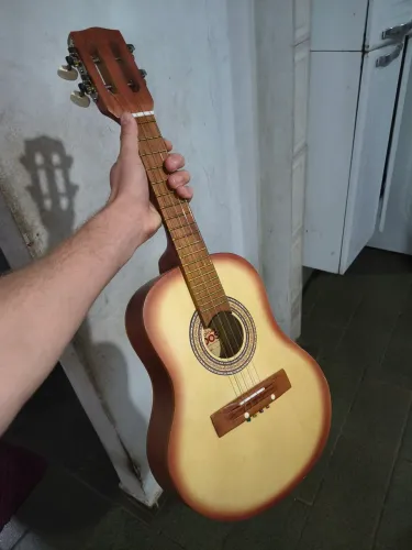 Cavaquinho em perfeito estado troco por violão corda de aço ou teclado 