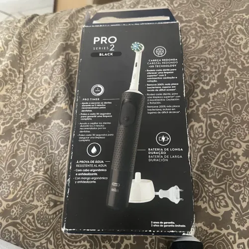 Escova elétrica oral B