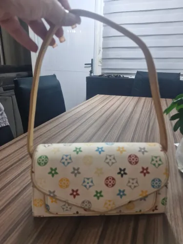 Bolsa da Louis Vuitton, com vários divisões