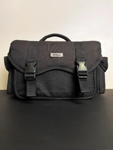 nikon d5100 + 3 lentes + microfone + case